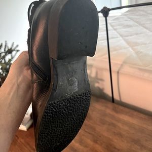 Black leather fashion boots.